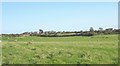 View east across pasture land towards the hamlet of Capel Gwyn