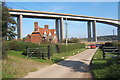 Driveway to Wherstead Hall backed by the Orwell Bridge