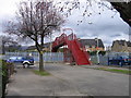 Red bridge and  blue cars at Alloa