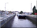 Container barge enters Latchford lock