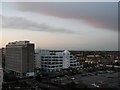 Bournemouth: pink-edged cloud over office blocks