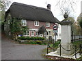 Ebbesbourne Wake: war memorial and Old Forge Cottage