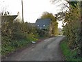 Farmhouse with barn conversion attached on a country road at  Llandow