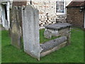 "Hog back" gravestone in St. George