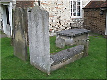 TQ1364 : "Hog back" gravestone in St. George's churchyard by Mike Quinn