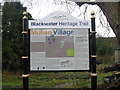 H7046 : Information sign, Mullan Village by Kieran Campbell
