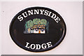 House name plaque "Sunnyside Lodge"