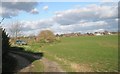 Bend in track skirting Rigates Home Farm Cottages