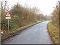 SP6304 : "Pedestrians Crossing" sign on lane through golf course by David Hawgood