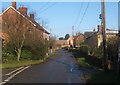 Looking north along the lane through Ash Street