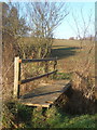 Footbridge in little valley between Nedging and Naughton