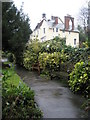 Empty seats on path from Castle Arch to Castle Hill