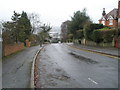 Looking back down Pewley Hill from Poyle Road