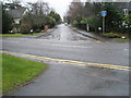 Looking up Clifford Manor Road from Pilgrims Way