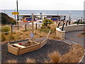 Boscombe: wooden boat in garden