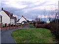 Site of an old footpath, incorporated into the street layout