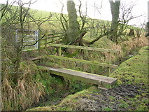 SD9050 : Footbridge on Pennine way by John H Darch