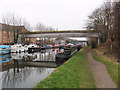 Covered pipe bridge by St John