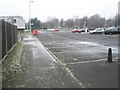 A sparsely filled car park behind Havant Police Station