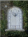 Sundial on New Inn Cottage, formerly a pub of the same name