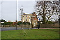 Road sign at the junction of Rough Rd & A290