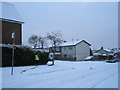 The junction of  Winchcombe and Elkstone Roads in the snow