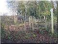 Stile on footpath up the hill