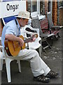 Musician Entertaining at Ongar Station