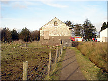 SX5873 : Disused building next to Princetown Fire Station by MrC