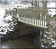SK5701 : Snow covered footbridge by Mat Fascione