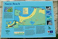 G7099 : Naran - Beach sign regarding low tide by Joseph Mischyshyn