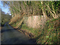 Boarded up quarry entrance at Garden House Wood