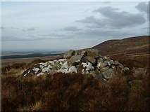 NT0956 : Old cairn on Colzium Hill by Jim Barton