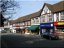 TQ0049 : Row of shops on Epsom Road by Nick Smith