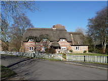 SU3243 : Abbotts Ann - Flint And Brick Cottage by Chris Talbot