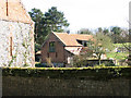 A converted flint and brick barn