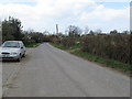 View west along metalled road that ends at Grays Farm