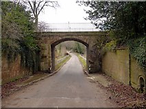 NU2517 : Bridge carrying Howick Hall path over road by Andrew Curtis