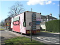 Fairground ride passing The Avenue