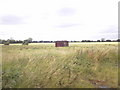 Off track  Railway truck in a grass field near Spaldington Common