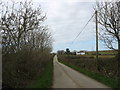 The road to the B5111 near Bronygaer Farm