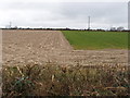 T0025 : Ploughed field near Kyle Cross Roads by David Hawgood