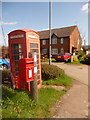 ST9764 : St. Edith’s Marsh: postbox № SN15 221 and redundant phone box by Chris Downer