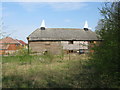 Rear of disused oast house on Hollow Lane