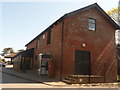 Barton on Sea: old warehouse type building, Hoburne Park