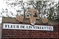 Artistic street sign, Fleur De Lis Street E1