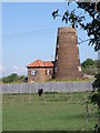 TL2095 : Windmill tower near Stanground by Michael Trolove
