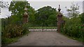 Imposing gateway on Vann Lane near Hambledon