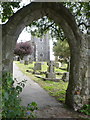The footpath from Dane Lane goes through this arch and enters the churchyard of St. Michael and All Angels, Hartlip