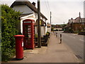 ST8211 : Shillingstone: postbox № DT11 93 and phone, The Cross by Chris Downer